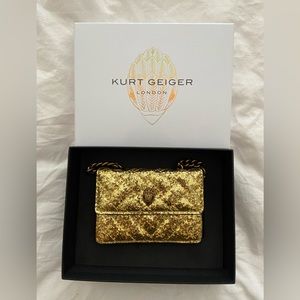 Kurt Geiger Micro Kensington in gold
